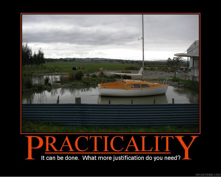 Picture of a trailer sailer in a small pond in an inland road. Caption: Practicality. It can be done - what more excuse do you need?