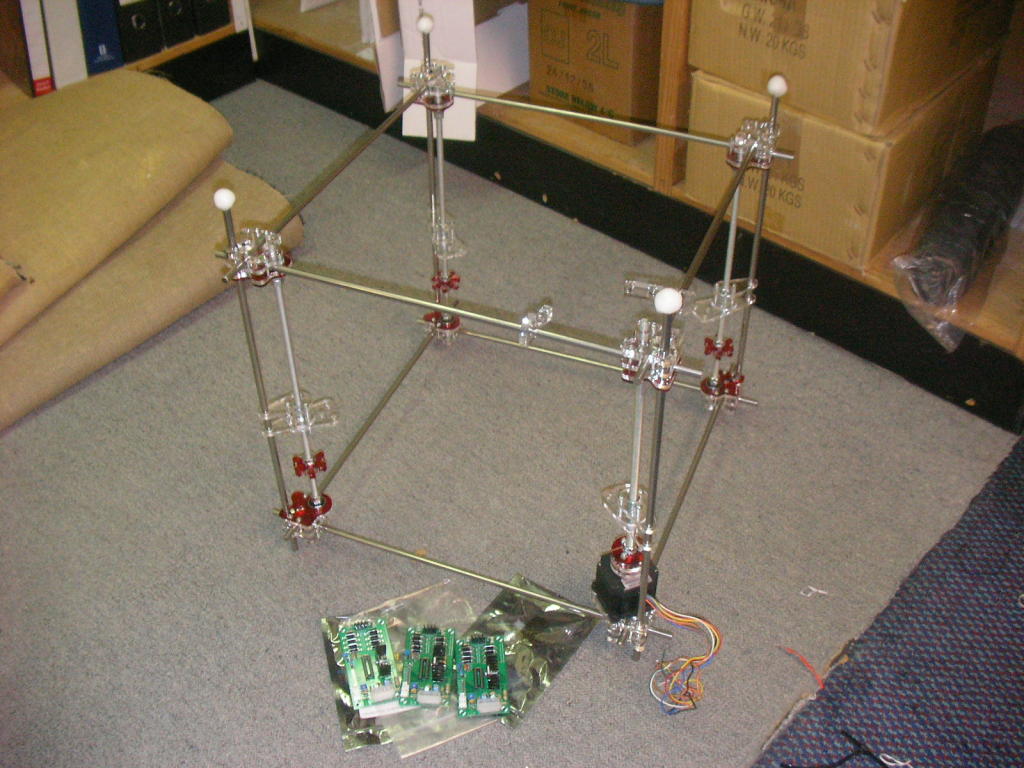 A picture of my RepRap with the top frame in place and the three Stepper Motor Controller PCBs